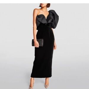 Sculptural black cocktail dress.
